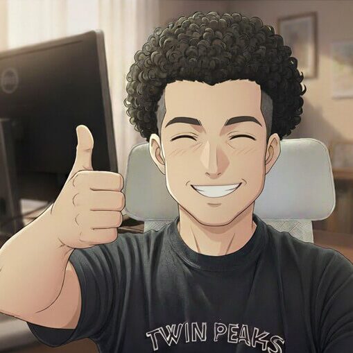 デスクの前で、笑顔でグッドポーズをしているアニメ風の男性のイラスト